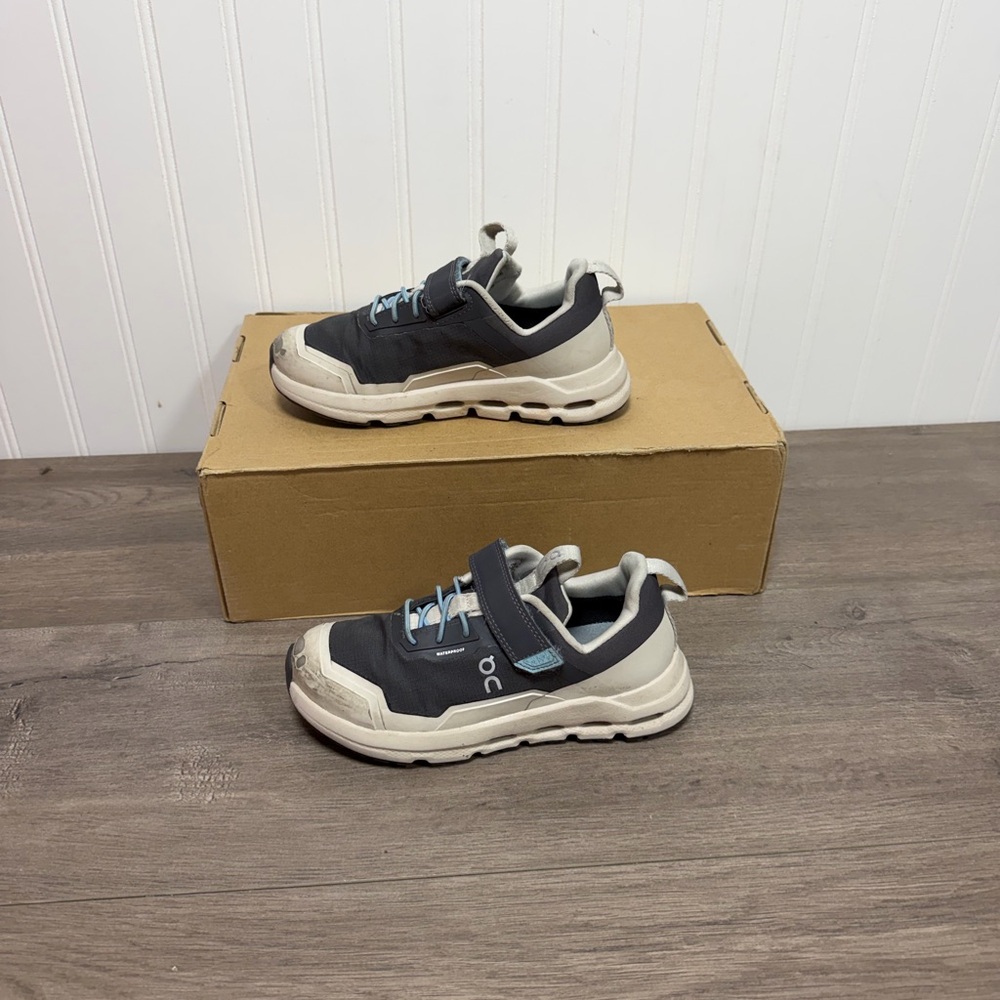 On Running Kids Sneakers in Dark Gray and White with Light Blue Accents